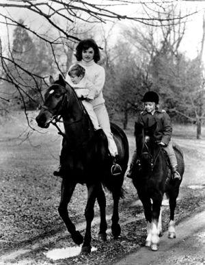 jackie bouvier kennedy with her children horseriding.jpg